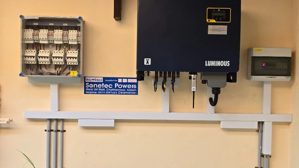 25 kWp commercial on-grid solar installation at Dr Pradeep's Sindhoor Ayurveda Hospital in Kollam featuring Luminous NXi 325 inverter and Sonetec Powers plaque